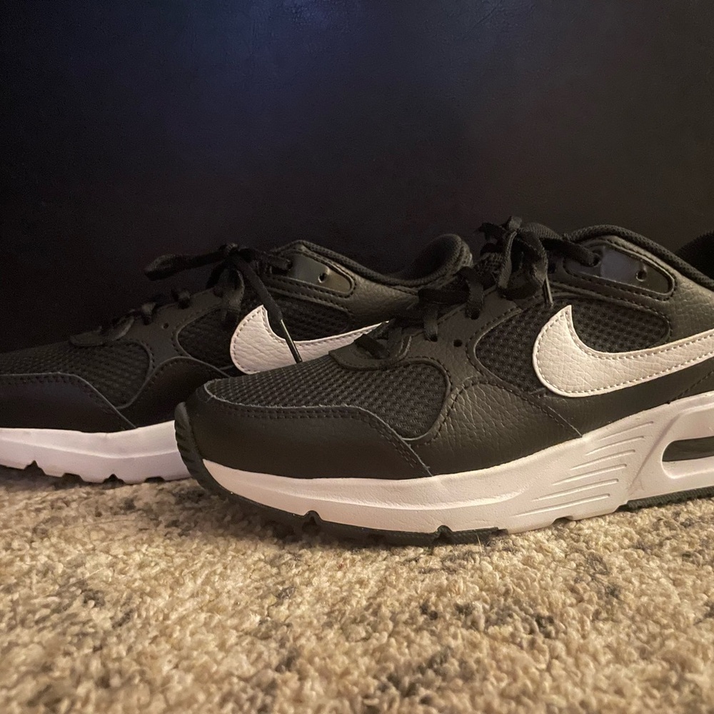 Nike women’s black sneakers WORN ONCE!